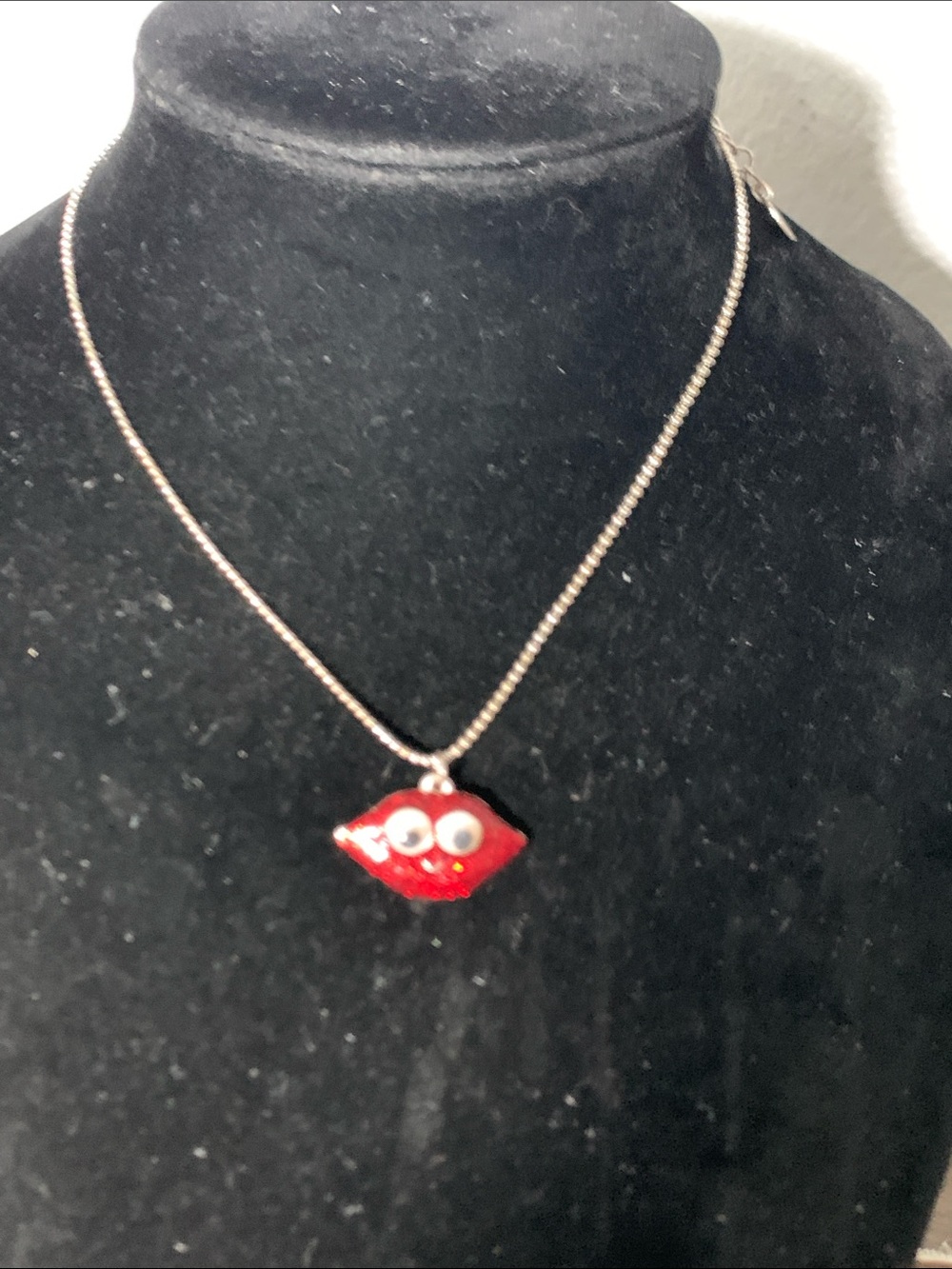 Claire's Red Lip Pendant Necklace with Googly Eyes
